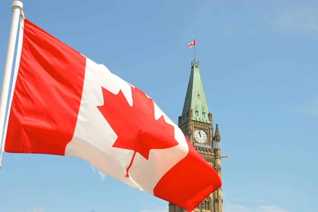 Canadian flag in front of Parliament