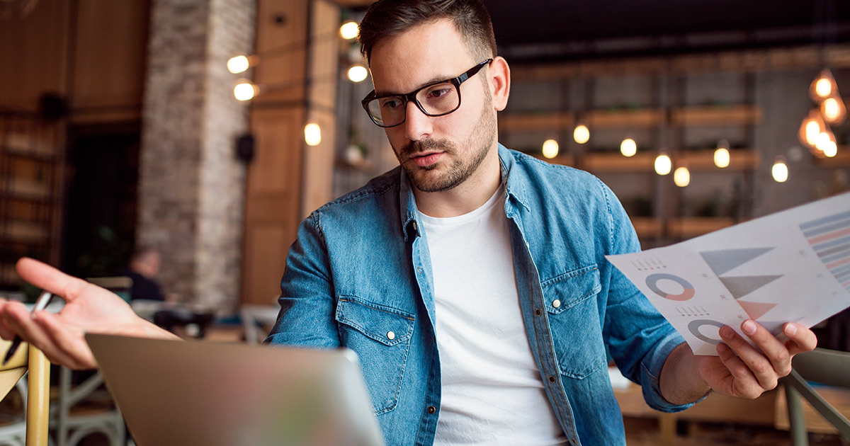 man reviewing documents