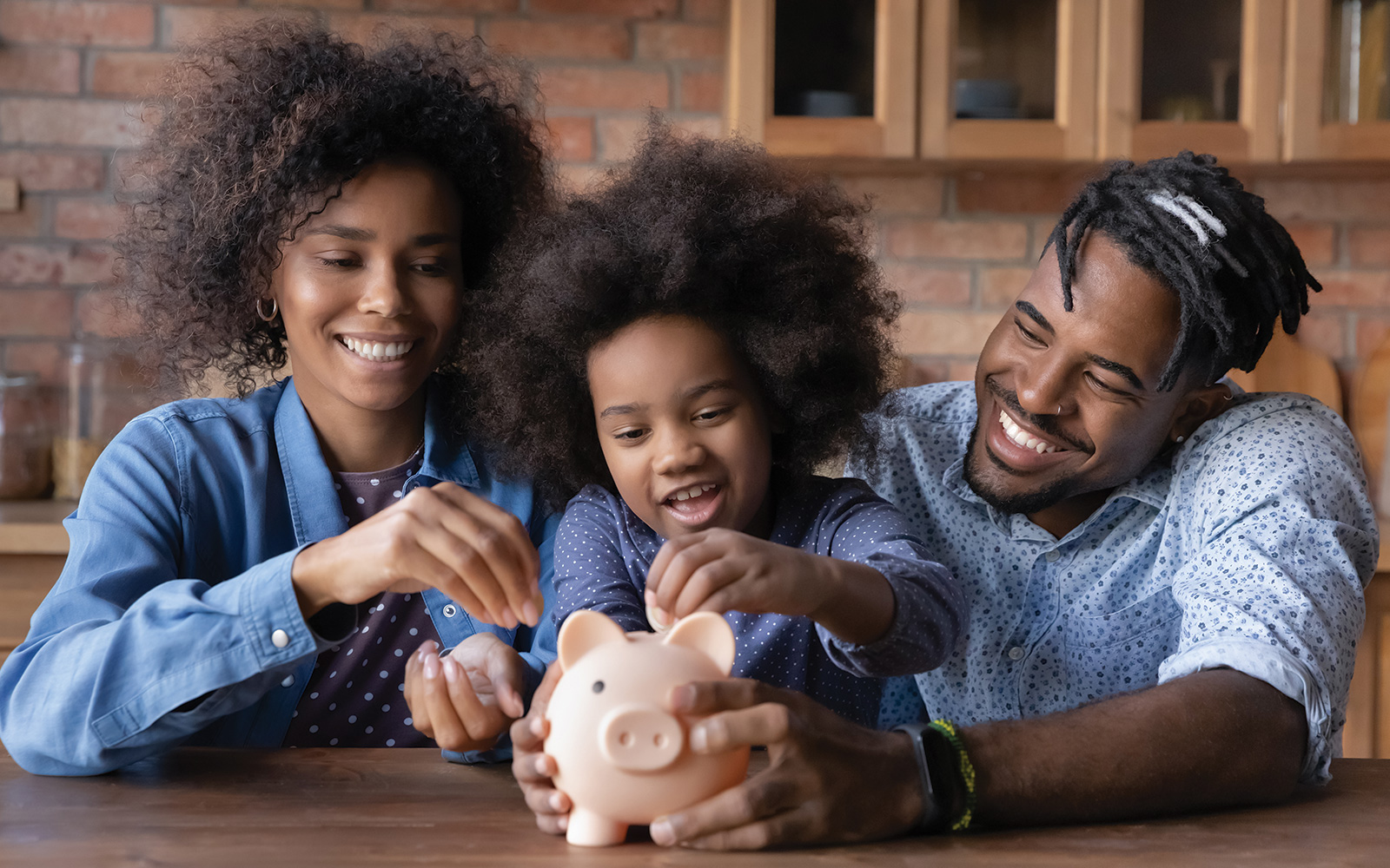 family discussing finances with their daughter