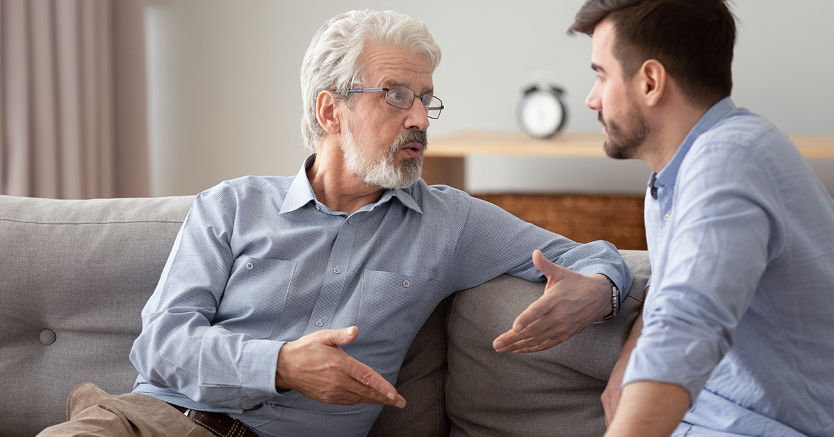 Father and son sharing conversation