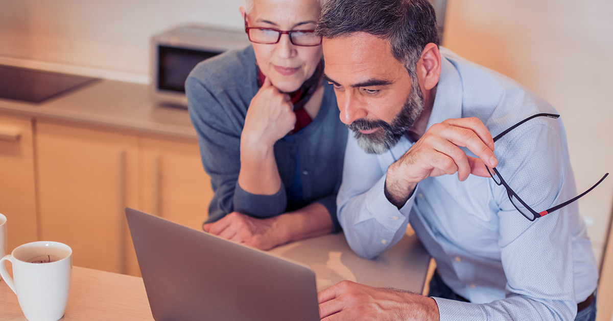 couple at home on a laptop