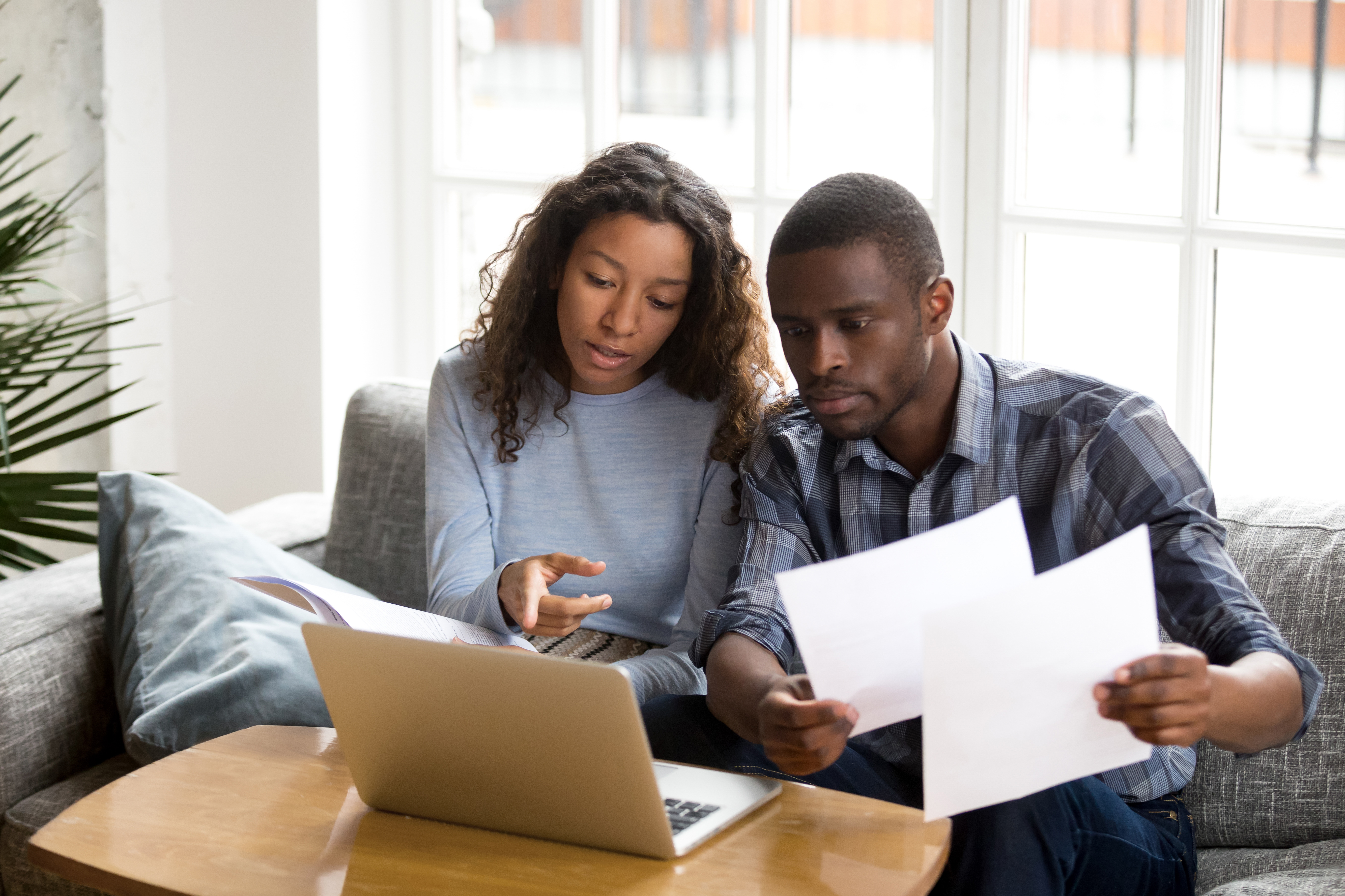 Partners reviewing one spouses debt