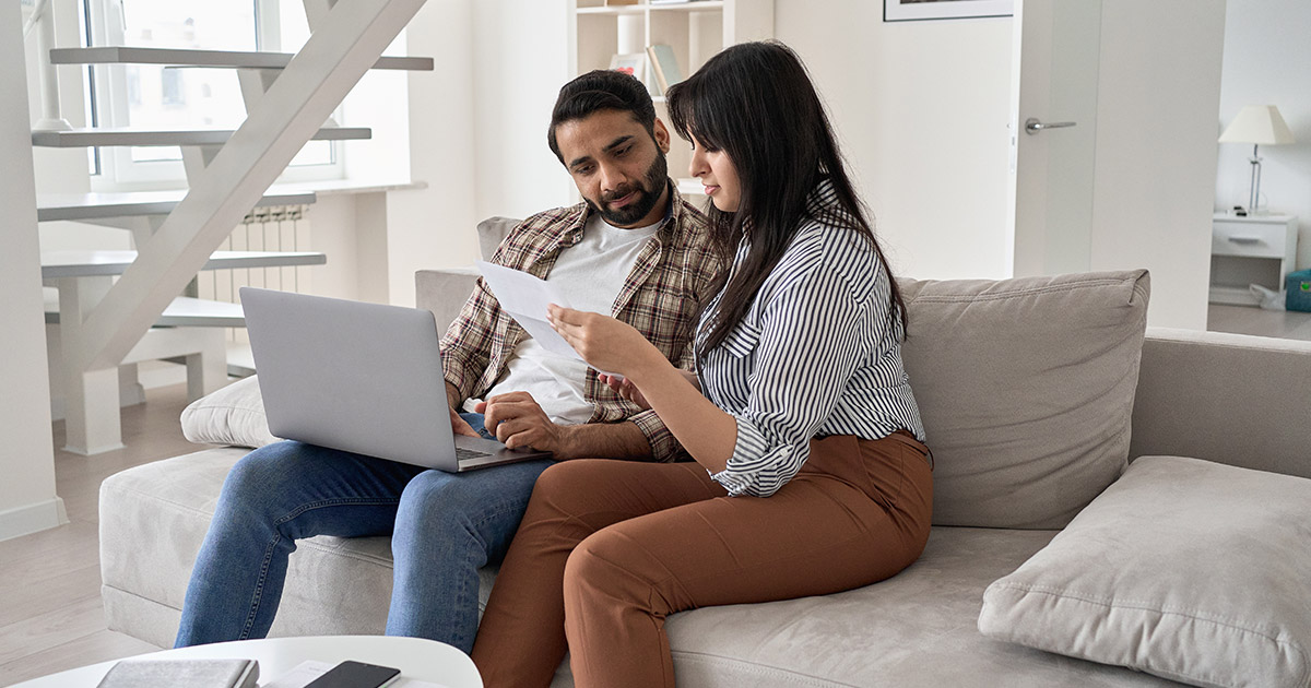 couple paying bills together